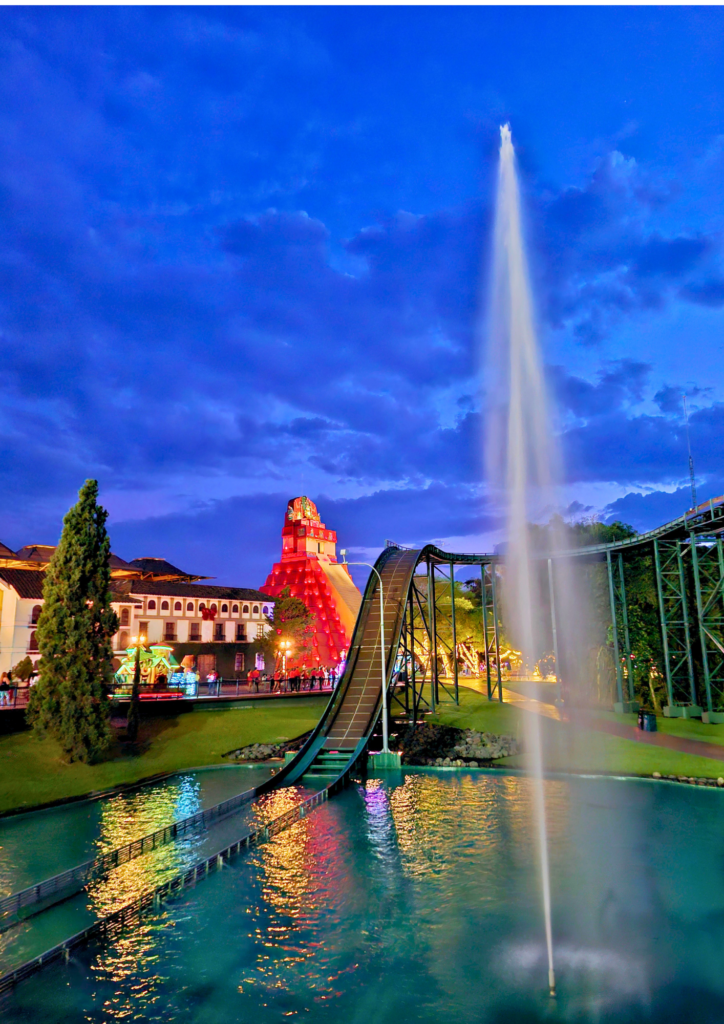 A modern replica of the iconic Mayan Temple of Tikal at the IRTRA amusement park, blending Guatemala's ancient architecture with contemporary recreation.
